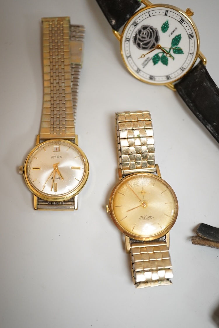 Eight assorted mainly gentleman's wrist watches, including a steel and gold plated Trident, Fero and over sized Citron.